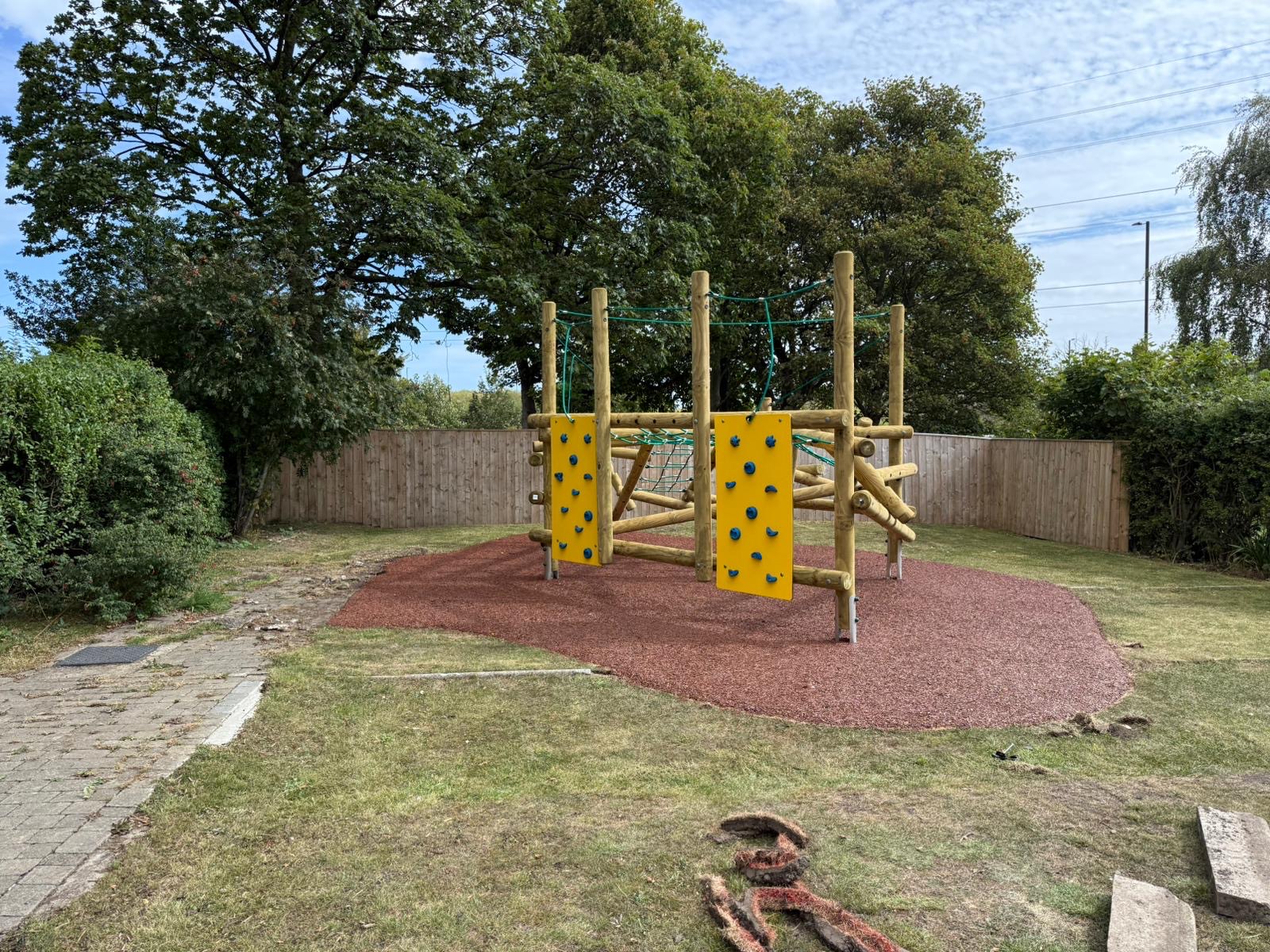 Swing Set Area with Red Wet Pour Surface
