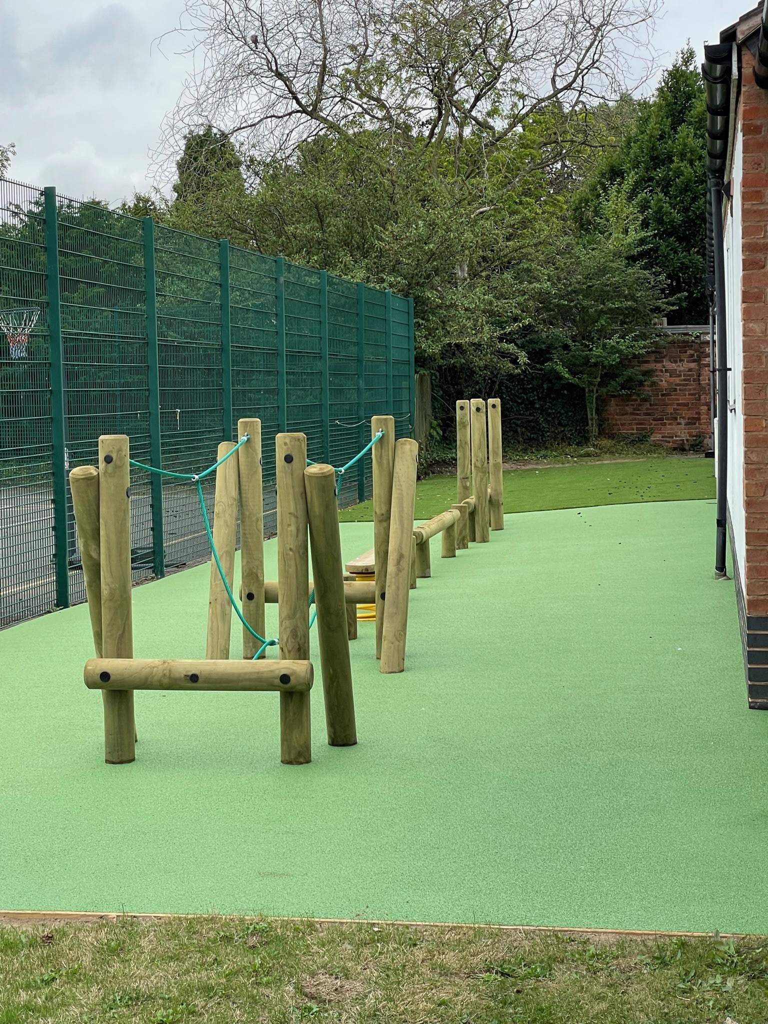 Timber Climbing Frame with Red Pour Surface